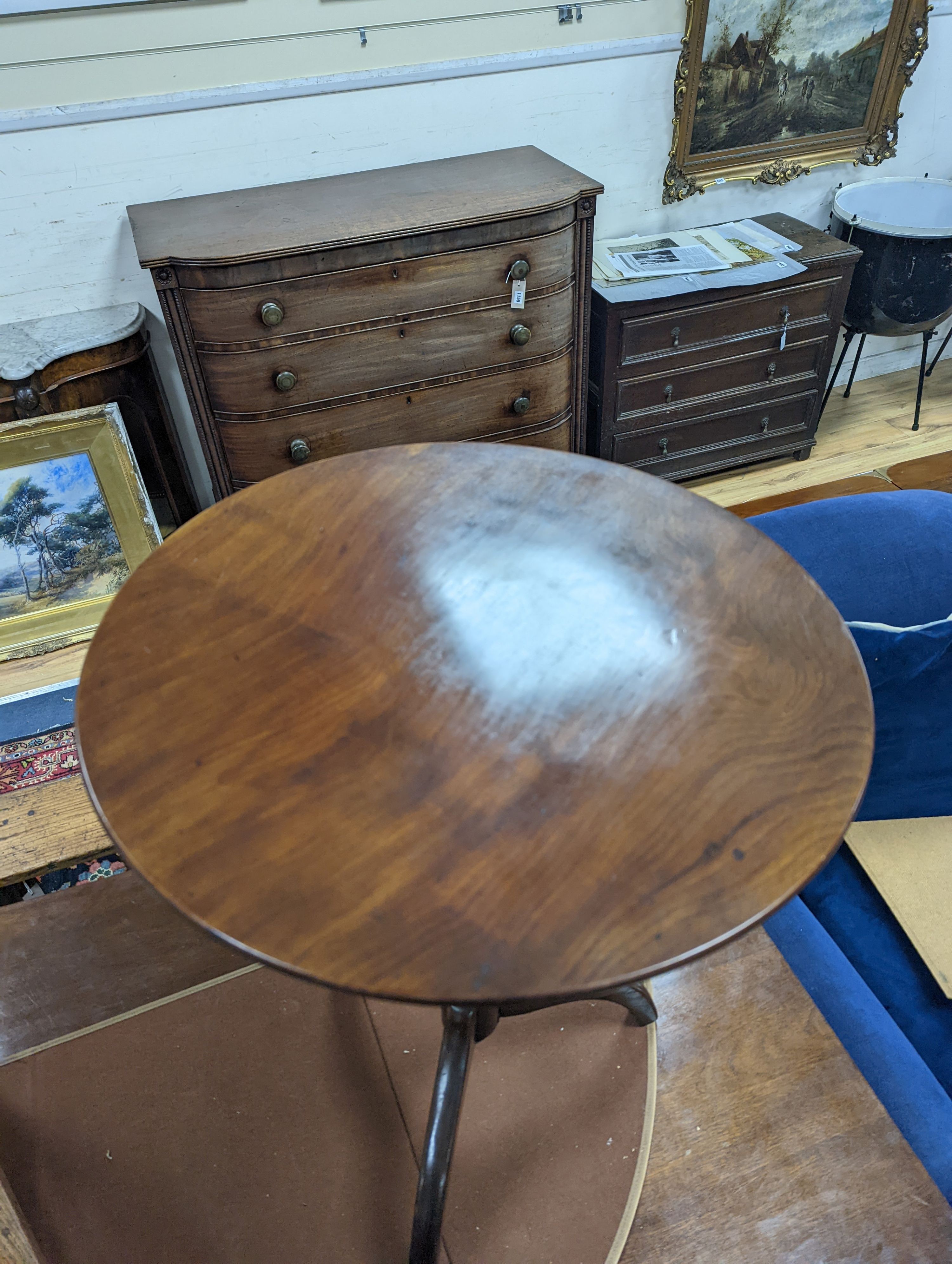 A 19th century circular mahogany tripod wine table, diameter 50cm, height 66cm